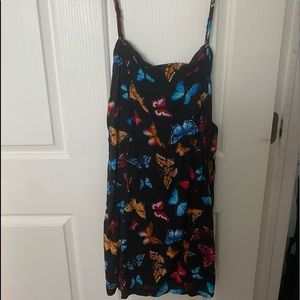 Black dress with multi colored butterflies